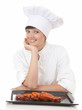 happy chef woman with raw meat, white background