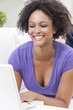 Mixed Race African American Girl Using Laptop Computer