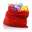 Santa Claus red bag with Christmas toys on white