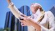 Female using her smart phone