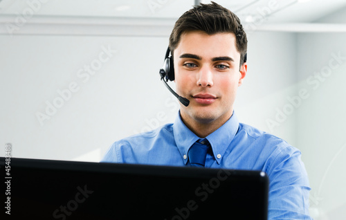 Photo: Businessman working on his computer Businessman working on his computer