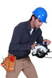 Tradesman using a circular saw