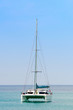 Luxury white sail catamaran boat in the sea
