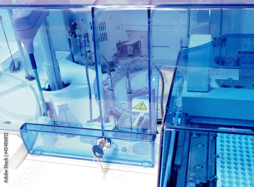 Photo: Biochemical analyzer at modern coo. Laboratory equipment. Biochemical analyzer at modern coo. Laboratory equipment.