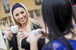 Girls drinking coffe in restaurant