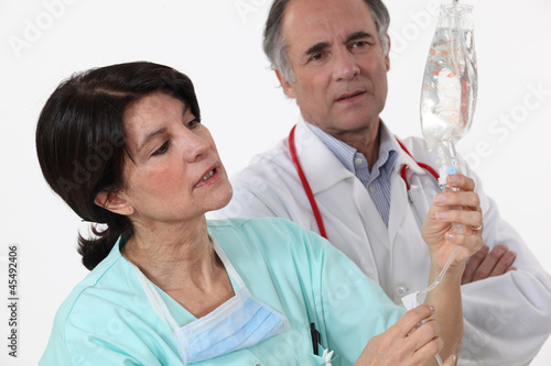 Photo: Nurse checking perfusion Nurse checking perfusion