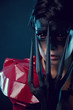 Portrait of a spooky red eyed demon