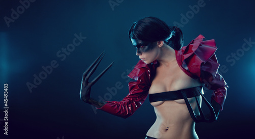 Photo: Creepy female demon with sharp black fingers Creepy female demon with sharp black fingers
