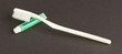 Toothbrush and green toothpaste isolated