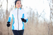 Young Asian woman jogging