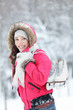 Beautiful Asian woman holding ice skates