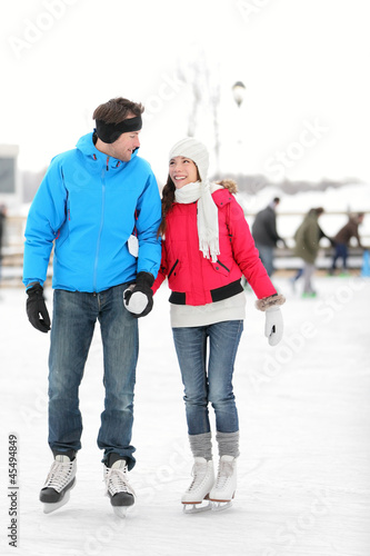 Photo: Romantic couple ice skating Romantic couple ice skating