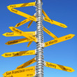 Milestone against blue sky