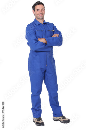 Photo: Full length worker in a boiler suit Full length worker in a boiler suit