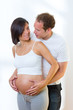 Beautiful pregnant woman with husband couple