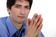 Businessman praying