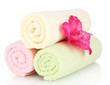 bright towels and flower isolated on white