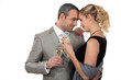 Couple dancing with glasses of champagne