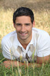 man lying on the grass