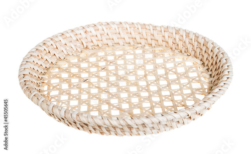 Photo: Wickerwork empty yellow breadbasket on white background Wickerwork empty yellow breadbasket on white background