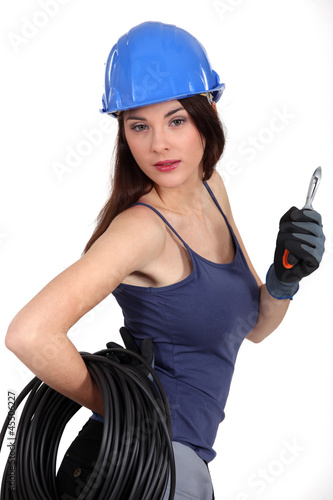 Photo: Seductive brunette electrician Seductive brunette electrician