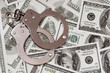 Dollars and handcuffs