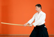 The man carries out exercises  aikido