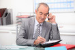 Photo: Businessman planning an appointment Businessman planning an appointment