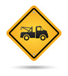 yellow tow road sign isolated