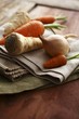 Foto: An onion, carrots and a parsnip An onion, carrots and a parsnip