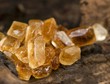 Brown candided sugar on a wooden surface