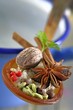 Various spices on a mixing spoon