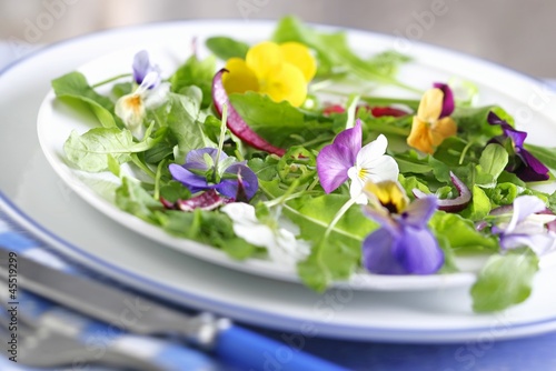 Photo: Rocket salad with edible flowers Rocket salad with edible flowers