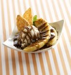 Photo: Banana Foster with Vanilla Ice Cream, Wafer Cookies and Caramel Sauce Banana Foster with Vanilla Ice Cream, Wafer Cookies and Caramel Sauce