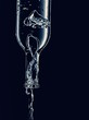 Water being poured out of a bottle