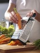 Photo: Grating carrots Grating carrots