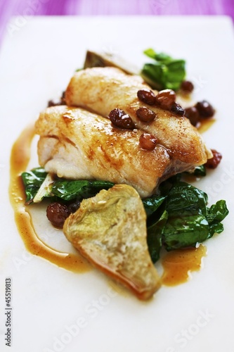 Photo: Fillet of bream with chard, artichokes and raisins Fillet of bream with chard, artichokes and raisins