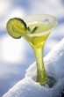 Lime Martini in Fun Stem Glass with Lime Garnish; On Snowy Railing