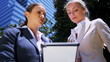 Business colleagues using wireless  internet
