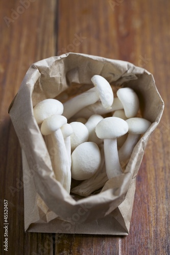 Photo: Enoki Mushrooms in a Brown Paper Bag Enoki Mushrooms in a Brown Paper Bag