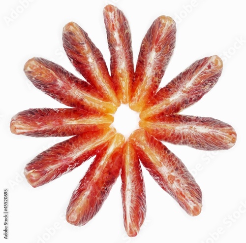 Photo: Blood orange segments, arranged in the shape of a flower Blood orange segments, arranged in the shape of a flower