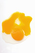 Egg yolk on white background
