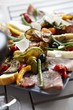 Antipasti platter with sausage, cheese and vegetables