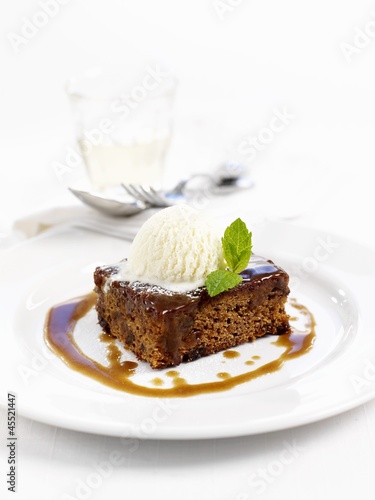 Photo: Sticky toffee pudding with vanilla ice cream Sticky toffee pudding with vanilla ice cream