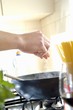 Seasoning ingredients in a frying pan