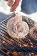 Pork on barbecue grill rack