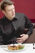 Man feeling full during meal