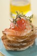 Fried cherry tomato and prawn on toast