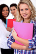 Young woman at school with her friends