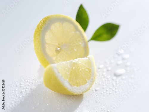 Photo: Slice and wedge of lemon Slice and wedge of lemon
